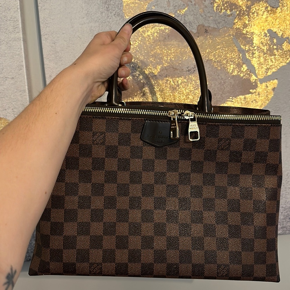 Louis Vuitton handbag with shoulder strap gently used